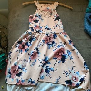 Peach dress with flowers and long train back to dress.  It has a stain.